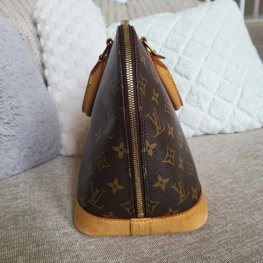 Authentic Louis Vuitton Monogram Alma PM Hand Bag..